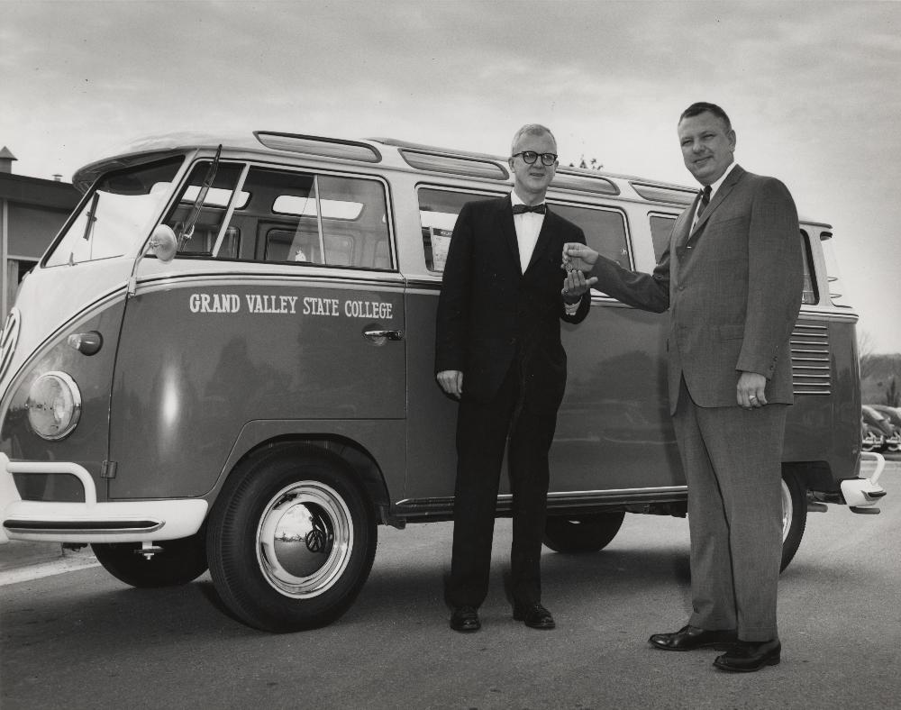 1960's person handing over keys to van